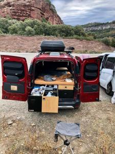 a red suv with its back open with its trunk at Dacia Dokker Camperiz in Palma de Mallorca