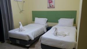 Postel nebo postele na pokoji v ubytování HOTEL BNL