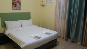 Postel nebo postele na pokoji v ubytování HOTEL BNL
