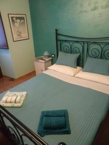 Postel nebo postele na pokoji v ubytování B&B Masseria Majella