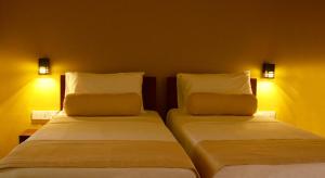 Postel nebo postele na pokoji v ubytování Inlak Garden Hotel + 37 fotografií