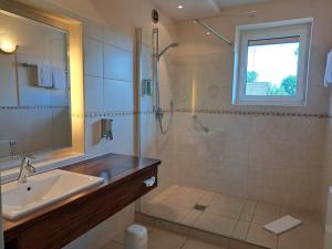 Vannituba majutusasutuses Hotel Heide Kröpke