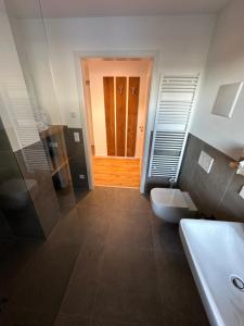 Phòng tắm tại Ferienwohnung Amalie +22 ảnh