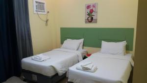 Postel nebo postele na pokoji v ubytování HOTEL BNL