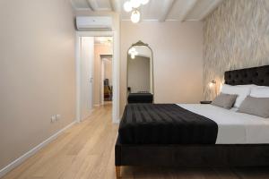 Llit o llits en una habitació de Classbnb - Bilocale di design in zona Sempione
