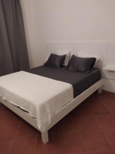 Ένα ή περισσότερα κρεβάτια σε δωμάτιο στο Apartament in Porto Antigo 2 - Santa Maria +16 φωτογραφίες