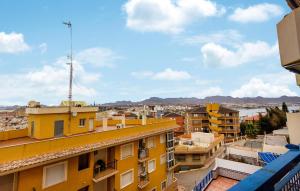 a view of a city from a building at Lovely Apartment In Puerto De Mazarrón in Puerto de Mazarrón