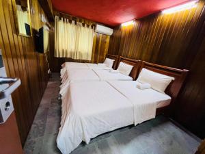 Ліжко або ліжка в номері i villa inn