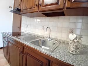 Η κουζίνα ή μικρή κουζίνα στο Residence Giardino +63 φωτογραφίες