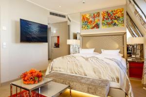 Ένα ή περισσότερα κρεβάτια σε δωμάτιο στο Boutiquehotel Das Tyrol
