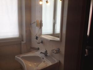 Koupelna v ubytování Hotel Belforte