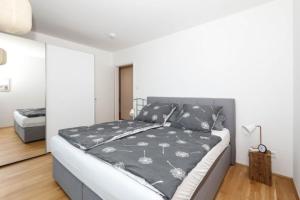 Llit o llits en una habitació de Ferienwohnung Baltrum - b49671