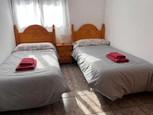 Postel nebo postele na pokoji v ubytování Apartamento La Ermita