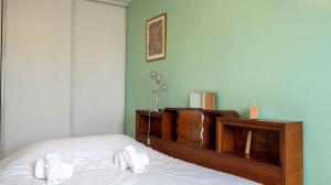 Posteľ alebo postele v izbe v ubytovaní L'Intemporel - Appartement T3 avec jardinet