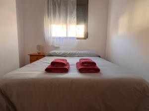 Postel nebo postele na pokoji v ubytování Apartamento La Ermita