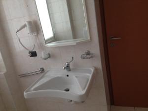 Koupelna v ubytování Hotel Belforte