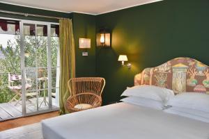 Postel nebo postele na pokoji v ubytování Relais Villino Rubini + 37 fotografií