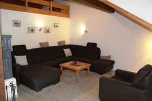 Posezení v ubytování Ferienwohnung Sonnentau im Feriendorf Sonnenhang im Allgäu + 14 fotografií