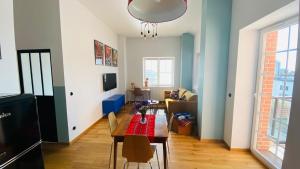 TV a/nebo společenská místnost v ubytování Apartament w Młynie Różanka