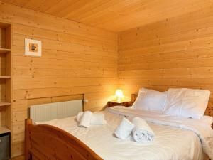 Rúm í herbergi á Chalet Marolly - Evolène