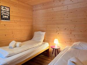 Rúm í herbergi á Chalet Marolly - Evolène