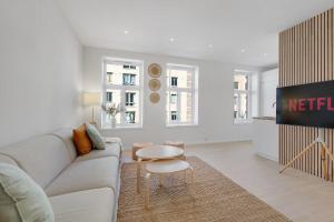 a living room with a couch and a table at Fantastic apartment in Oslo in Oslo