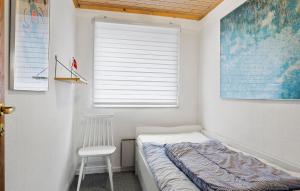 Krevet ili kreveti u jedinici u objektu 3 Bedroom Amazing Home In Nysted
