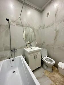 Um banheiro em Абсолютно новая евродвушка в ЖК Комфортсити