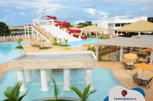 a resort with a water park with a slide at L'acqua diRoma 12345 - Gualberto in Caldas Novas