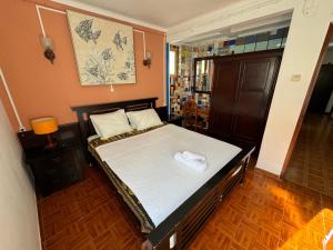 Ένα ή περισσότερα κρεβάτια σε δωμάτιο στο Lagos Central Hostel