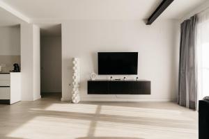 TV a/nebo společenská místnost v ubytování Bahía Encanto