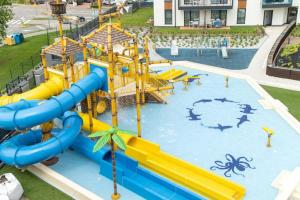 a water park with a water slide at Blue Seashell Studio Bel Mare near the Beach by Renters in Międzyzdroje
