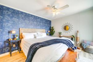 a bedroom with a bed and a ceiling fan at Kill Devil Hills Condo with Beach Access On-Site! in Kill Devil Hills