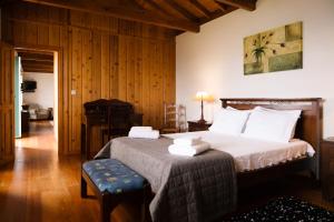 Ένα ή περισσότερα κρεβάτια σε δωμάτιο στο Villa Mistério