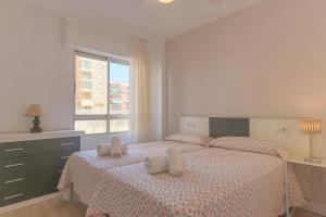 Posteľ alebo postele v izbe v ubytovaní 080 - Gaviotas 004 - comfortHOLIDAYS