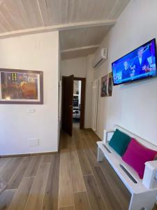 TV a/nebo společenská místnost v ubytování Racconti di pietra