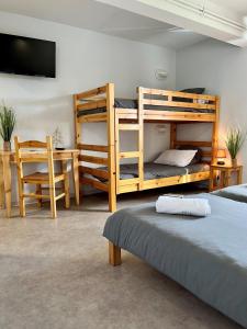 Postel nebo postele na pokoji v ubytování Chalet Ma Neou