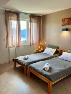 Postel nebo postele na pokoji v ubytování Chalet Ma Neou
