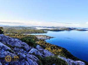 an aerial view of a large body of water at SOL- Seafront House Croatia: your holiday first row to the beach in Drage +17 photos