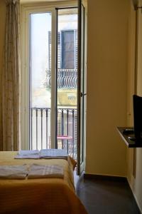 A bed or beds in a room at B&B Vivaldi