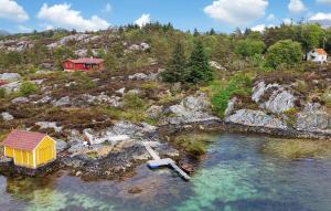 an aerial view of a small house in the water at 3 Bedroom Awesome Home In Finns in Kuleseid