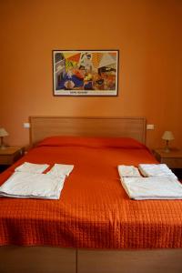A bed or beds in a room at B&B Vivaldi