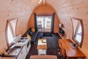 Η κουζίνα ή μικρή κουζίνα στο Chalet Éloise à louer avec spa Mauricie +8 φωτογραφίες