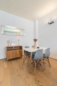a dining room with a table and chairs at Functional apartment in the center of Lille in Lille