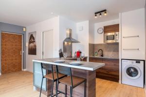 Η κουζίνα ή μικρή κουζίνα στο Functional apartment near the center parking