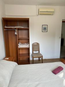 Postel nebo postele na pokoji v ubytování Apartments Šimić