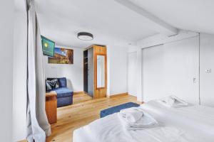 Postel nebo postele na pokoji v ubytování Weidegg - Hotel Garni
