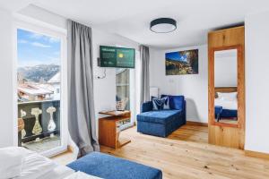 Postel nebo postele na pokoji v ubytování Weidegg - Hotel Garni