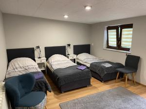 Postel nebo postele na pokoji v ubytování NOCLEGI-SPŁYWY BUGIEM