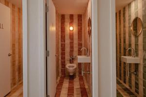 Koupelna v ubytování Hotel Lucine